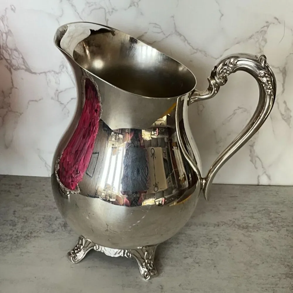 Vintage F. B. Rogers Silver Co. silver plated water pitcher with ice catch